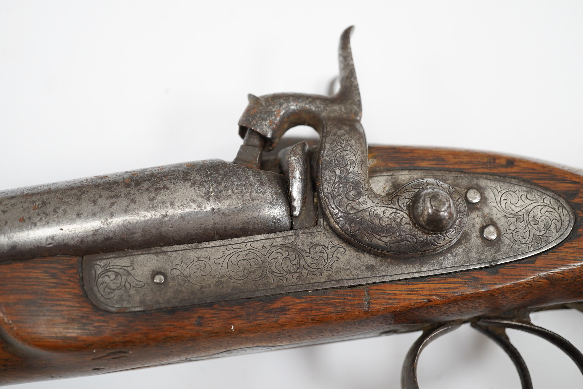 A Turkish flintlock Kubar pistol, with fully stocked brass mounts, polished steel lock and barrel (well worn), barrel 31cm, and a double barrel 12 bore percussion pistol cut down from a sporting gun, barrel 26.5cm, (2).